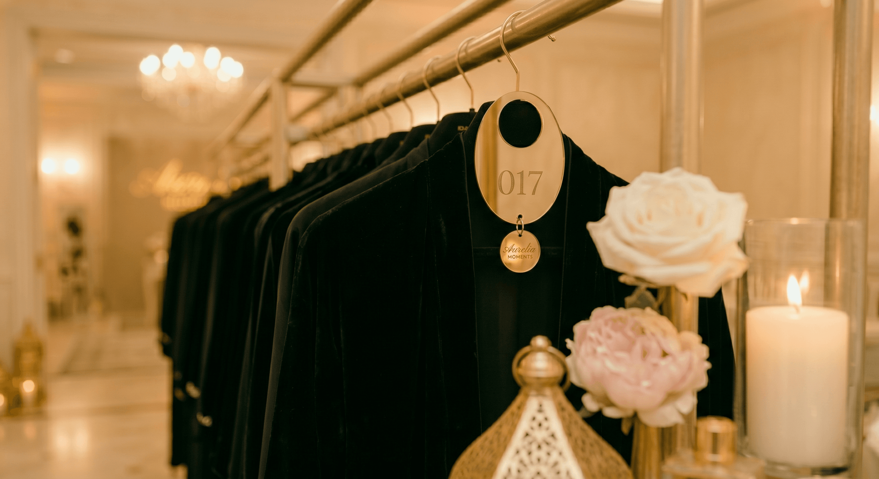 Gold hangers detail for abaya valet presentation